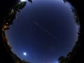 Il passaggio della ISS durante l’eclisse parziale di Luna