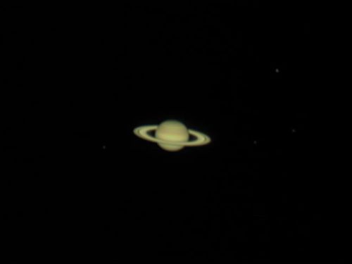 Saturno e queattro delle sue lune