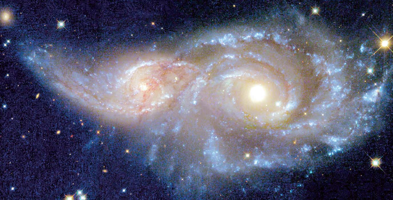 NGC 2207 e IC 2163, altra coppia di galassie INTERAGENTI – ma ne siamo proprio sicuri?