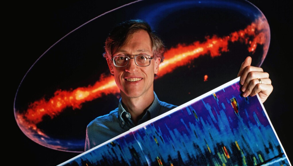 Scientist with Radio Sky Map