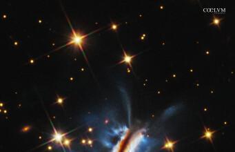 Futuri Pianeti nella Farfalla VariopintaGiovane Protostella IRAS 23077+6707