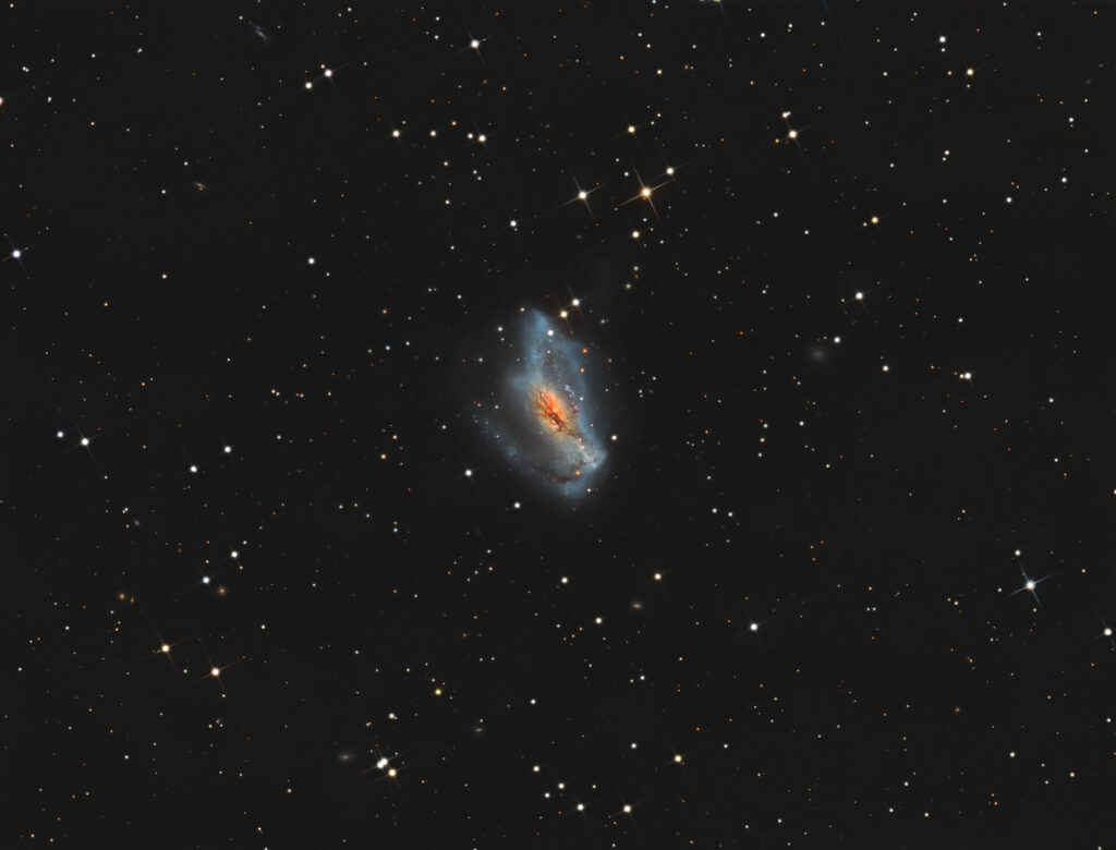 NGC 2146 – Un abbraccio galattico